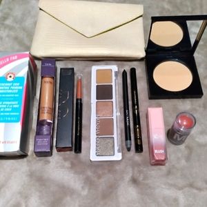 Eyeshadow,highlight,lip liner,primer,eyeliner, blush& pressed powder.